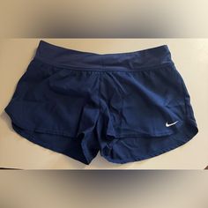 Never Worn Size Medium Navy Blue With Built In Liner Nike Blue Shorts For Beach, Nike Navy Shorts For Summer, Nike Running Shorts, Shorts Nike, Nike Blue, Shorts Athletic, Nike Running, Nike Shorts, Running Shorts