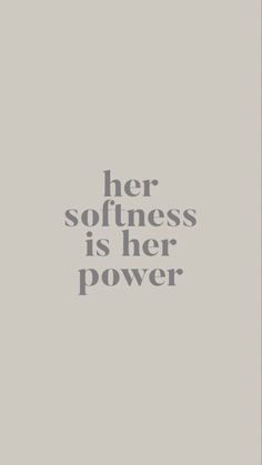 the words her softness is her power are shown in grey on a gray background