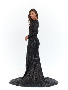 The Kaya is an elegant long sleeved gown. Made from geometric shimmering sequins fabric to make you look & feel incredible. The material is super stretchy and is lined to the hem. There is a hidden zipper on the back. What is a Made-To-Order? This product is a made-to-order item. Made-to-order items are not held in physical stock and production commences AFTER order placement. We try to limit production and stock levels and as such, made-to-order items produce less waste and allow you to purchas Glamorous Long Sleeve Prom Gown, Glamorous Long Sleeve Gown For Prom Season, Long Sleeve Sequin Gown For Night Out, Long Sleeve Embellished Gown For Night Out, Fitted Long Sleeve Sequin Gown, Long Sleeve Gown With Sequins For Night Out, Sequined Long Sleeve Gown For Night Out, Fitted Long Sleeve Gown With Sequins, Glamorous Floor-length Evening Dress For Fall