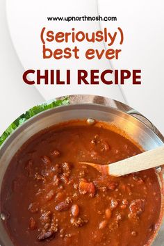 a pot full of chili with a wooden spoon in it and the words seriously best ever