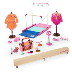 an assortment of children's clothing and accessories on a white surface with a wooden stand