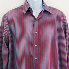 Men's Robert Graham Blue & Red Striped Dress Shirt Flip Cuffs, Spread Collar, Long Sleeves. Knowledg Wisdom Truth tag. Made in India Size - Large Condition - Preowned - Extra buttons still attached. No stains, holes or tears. Measurements Pit to pit - 24.25" Shoulder to cuff - 25.25" Shoulder to hem - 27" Red Long Sleeve Dress Shirt For Business, Red Button-up Dress Shirt For Business, Red Long Sleeve Dress Shirt For Formal Occasions, Red Striped Dress, Robert Graham, Striped Dress, Dress Shirt, Cuff, India