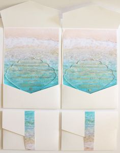 two pieces of paper that have been cut into the shape of an ocean scene with words on them