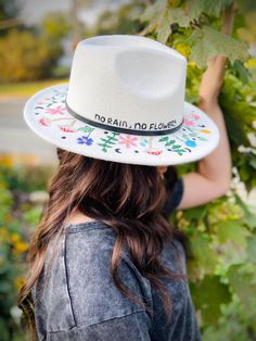 This beautifully detailed floral hat was hand- bunrned for depth in design as well as being hand painted for color and vibrancy on this white hat. It is 57 cm; which would convert to a size medium hat. White Brimmed Felt Hat For Summer, White Felt Hat With Short Brim For Summer, White Flat Brim Felt Hat For Summer, White Spring Felt Hat With Short Brim, White Flat Brim Felt Hat For Spring, White Curved Brim Panama Hat For Spring, Spring White Adjustable Felt Hat, White Flat Brim Panama Hat For Spring, White Adjustable Felt Hat For Spring