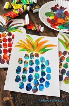 paper plate crafts with pineapples and watercolor paints on them for kids to make