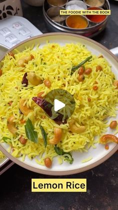 lemon rice on a plate with other dishes in the background