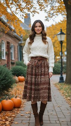 Combine comfort and style with a chunky sweater and flowy midi skirt. Perfect for a charming village stroll.       #FallFashion #ChunkySweater #MidiSkirt #ComfortStyle #VillageChic #fallfashiontrends #falloutfitsforwomen #falloutfitideas #falloutfitswomen #fashionista #styleInspo #ootd #streetStyle #fashionTrends #fashionBloggers #fashionLovers #fashiondesigner #fashionkids #fashionweek Skirt And Sweater, Fashionista Outfits, Midi Skirt Outfit, Trendy Outfits Winter, Trendy Fall Outfits, Thanksgiving Outfit, Winter Mode, Fashion Winter, Autumn Outfit