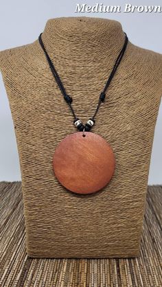 Circle Pendant Necklace Black Circle Necklace Wood Circle - Etsy Black Medallion With Large Pendant, Black Necklace With Large Round Pendant, Black Bohemian Medallion Jewelry, Wooden Beads Round Necklace As Gift, Wooden Beads Necklace Gift, Adjustable Brown Medallion Jewelry, Adjustable Black Medallion Jewelry, Adjustable Brown Medallion Necklace, Adjustable Black Medallion Necklace