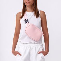 The Everyday Fanny Pack: the perfect hands-free, on the go essential. With zip pockets inside and out, a mesh compartment, an adjustable waist strap for easy fastening or shoulder wear, and sleek neoprene material that makes it machine washable, this fanny pack is a closet staple. Stay organized, hands-free, and ready for anything with this stylish fanny pack. Cheap Pink Belt Bag For School, Cheap Pink Belt Bag, Cheap Pink Belt Bag For Women, Affordable Pink Belt Bag For School, Stylish Fanny Pack, Perfect Hands, Closet Staples, Waist Strap, Stay Organized