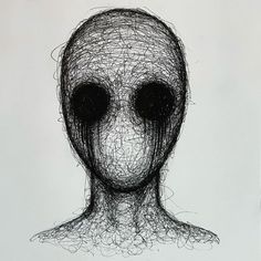 a drawing of an alien head with black eyes