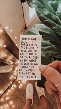 someone holding up a piece of paper that says god is not going to put the people in your life