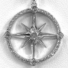 Let this piece help set your course for your next adventure in life and add some direction to your wardrobe. This is the perfect gift for the girl starting a new chapter in her life or the woman who appreciates meaningful jewelry. This maritime compass pendant is covered in white zircon and is made from strong and high-quality 925 sterling silver. Pendant Materials* Real 925 Sterling Silver* White Zircon* Hypoallergenic, Lead & Nickel Free* Rhodium Plated for Tarnish Free Finish* Includes 18 IN Diamond Compass Design Round Jewelry, Round Diamond Jewelry With Compass Design, White Gold Jewelry With Compass Design, Compass Design Round Pendant Jewelry For Anniversary, Round Pendant Compass Design Jewelry For Anniversary, White Gold Compass Pendant Jewelry, White Gold Compass Design Pendant Jewelry, Round Pendant Jewelry With Compass Design For Anniversary, White Gold Pendant With Compass Design