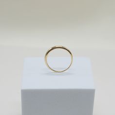 our easy to style Be My Baby Dome Ring will be your new go-to for daily wear. worn alone for a simple, minimal look or stacked together for a chic, layered look, you cannot go wrong with this modern classic. a staple in curating your capsule jewelry collection fine 14k solid gold 1.3 grams 2.5mm thick at top Timeless Stackable Diamond Ring For Everyday, Everyday Timeless Stackable Diamond Ring, Simple Stackable Initial Ring For Everyday, Timeless Stackable Round Cut Rings, Dainty Round Band Rings For Everyday, Timeless Stackable Rings With Open Band, 14k Gold Midi Rings For Everyday, Everyday Yellow Gold Initial Ring With Round Band, Everyday Stackable Rings With Round Cut