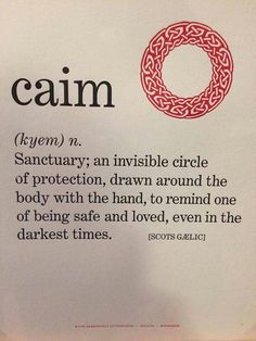 a hand holding up a piece of paper with the word calm written in red on it