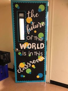 a door decorated with the words, the future of the world is in this classroom