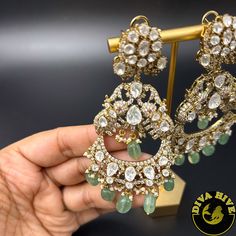 This Moissanite earring can be your statement and unique look. We Used Authentic Moissanite in our earring. Best quality guaranteed Metal : Brass Nickel Free Figure : Elephant Perfect for all big occasion Designer wear Handcrafted Luxury Meenakari Drop Earrings, Luxury Festive Fusion Earrings, Luxury Gold Plated Bridal Earrings With Meenakari, Green Diamond Earrings With Intricate Design, Elegant Heavy Green Earrings, Heavy Elegant Green Earrings, Simple Jewellery, Indian Jewelry Sets, Moissanite Earrings