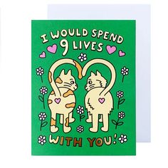 a green greeting card with two cats and the words i would spend 9 lives with you