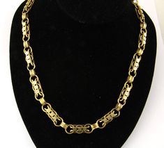 Antique Victorian Fancy Gold Chain Necklace A Victorian period antique solid yellow gold chain with fancy elongated links and a spring ring clasp. I have never seen another antique gold chain in this very pretty floral design Total length: 51 cm (20 inches) long Width of Links: 9 mm Weight: 22 grams Hallmarks: As with most Victorian period jewellery there are no hallmarks stamped on this piece but we have tested the metal as 14-18 carat solid gold. Visually I believe this to be a 15 carat gold. Victorian Gold Jewelry With Hooks And Links, Victorian Gold Chain Link Necklace, Vintage Gold Necklace With Hook And Links, Vintage Gold Necklace With Hooks And Links, Antique Oval Link Chain Necklace, Formal Gold Chain Necklace With Intricate Design, Gold Chain Necklace With Intricate Design For Formal Occasions, Victorian Gold Link Chain Necklace, Victorian Style Gold Link Chain Necklace