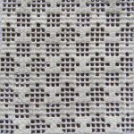 a close up view of a white woven material