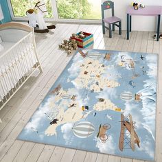 a baby's room with a large rug on the floor