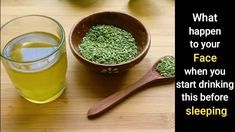 a wooden table topped with two bowls filled with green tea next to a spoon and cup