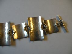 "Sterling silver Modernist Hammered Chain Toggle bracelet Marked - 925 37.8 grams All bracelet 6 7/8\", wearable length 5 5/8\" Very good to excellent condition. It is tarnished, will leave cleaning to the buyer." Toggle Bracelet, Everything Is Fine, Rhinestone Necklace, Metal Necklaces, Clear Rhinestones, Chain Link Bracelet, Link Bracelets, How To Look Pretty, Chain Link