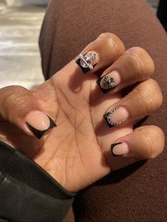 French Tip Acrylic Nails With Charms, Black French Tip With Chrome Heart, Short Black French Tip Nails With Charms, Black French Tips With Cross Charms, Black French Tip Chrome Hearts, Black Nails With Charms, Short Black French Tip Nails Chrome Hearts, Black Acrylic Nails