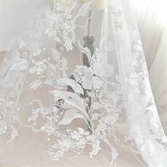 Gorgeous Floral Lace Fabric, Tulle Embroidered Lace Fabric, Wedding Dress Bridal Veil Floral Lace Fa Wedding Gown With Floral Applique In Floor-length, White Organza Dress For Mother Of The Bride, Embroidered Lace Gown For Banquets, Embroidered Lace Gown For Banquet, Lace Gown With Intricate Embroidery For Banquet, White Organza Floor-length Gown, White Organza Gown For Ceremony, White Floor-length Organza Gown, White Organza Gown With Floral Applique