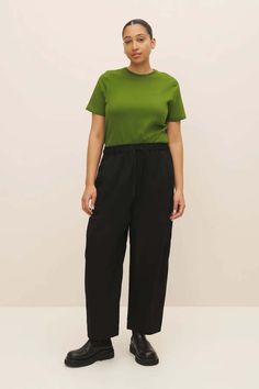 A new staple for your everyday wardrobe made from 100% certified fairtrade woven organic cotton twill. the fragment pant by kowtow is a refined and relaxed style that does not compromise on comfort. it features a mid-rise elasticated waist with a working drawcord and a full-length tapered leg with panel detail.    designed for a relaxed fit size down one size for a closer fit.  model is wearing a size m.  this product's measurements (inches):  size xxs xs s m l xl    front rise 15.9 15.9 16.0 16 Boxy Fit Cotton Bottoms For Work, Everyday Cotton Wide Leg Pants With Straight Hem, Circular Design, Genetically Modified, Garment Labels, Modern Lifestyle, Fashion Line, Harmful Chemicals, Everyday Wardrobe