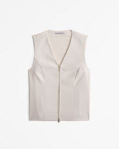 Women's Tailored Zip Vest | Women's Tops | Abercrombie.com Spring V-neck Top With Zipper Closure, Fitted V-neck Tops With Zipper Closure, Elegant Spring Tops With Zipper Closure, Sleeveless Workwear Vest With Zipper Closure, Zipper Closure Sleeveless Vest For Work, Elegant Workwear Top With Zipper Closure, Chic Vest With Zipper Closure, V-neck Tops With Zipper Closure For Spring, Spring V-neck Tops With Zipper Closure