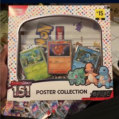 the pokemon poster collection box is packed with cards and other collectibles for sale