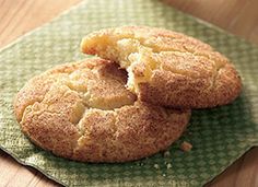 two cookies are sitting on a green napkin