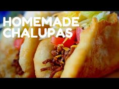 three tacos sitting on top of a plate with the words homemade chaupas