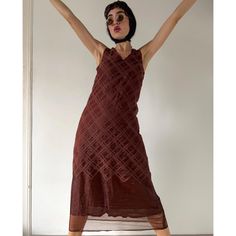 Capture the essence of bohemian elegance with this vintage 90s brown tank maxi dress by Amaya Arzuaga. Featuring a unique plaid pattern and sheer, lined fabric, this sleeveless gown evokes a romantic, medievalcore aesthetic. Its flowy tent silhouette offers a relaxed yet sophisticated fit, perfect for a variety of occasions. Whether you're embracing the medieval-inspired look or adding a touch of vintage boho to your wardrobe, this long dress is a timeless piece that effortlessly blends style an Tent Silhouette, Romantic Boho, Tank Maxi Dress, Sleeveless Gown, Maxi Robes, Maxi Tank Dress, Fall Style, Sheer Dress, Dress Clothes For Women