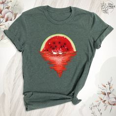 Watermelon Sunset T-Shirt, Tropical Sunset Fruit Summer Tee, Cool Watermelon Shirt, Funny Watermelon Gift Shirts, Fruit Watermelon T-Shirt. The Watermelon Sunset T-Shirt is perfect for summer vibes. Featuring a "Tropical Sunset Fruit Summer Tee" design, it combines the beauty of sunsets with a fun watermelon theme. This "Cool Watermelon Shirt" makes a playful statement, while "Funny Watermelon Gift Shirts" are ideal for gifting. Embrace the fruity fun with this "Fruit Watermelon T-Shirt." Hello, Green Summer Shirt With Funny Print, Red Fruit Print Tops For Summer, Summer Green Tops With Funny Print, Summer T-shirt With Strawberry Print And Crew Neck, Red Fruit Print Graphic Tee, Red Graphic Tee With Fruit Print, Red Summer T-shirt Crew Neck, Watermelon Graphic Print T-shirt For Summer, Fun Watermelon Colored Tops For Summer