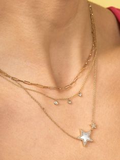 This delicate .13ctw diamond mini bezel necklace is on a 18" 14K gold chain with adjustable loops at 16" & 17". It is perfect for wearing everyday on its own or layered with another necklace or two. Available in 14K yellow, white or rose gold. Paper Clip Necklace, Necklace Stack, Pearl And Diamond Necklace, Bezel Necklace, Everyday Luxury, Diamond Solitaire Necklace, Dangle Necklaces, Solitaire Necklaces, Bezel Set Diamond