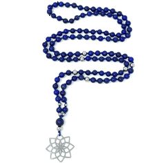 Enjoy this hand-knotted mala necklace made with blue lapis lazuli gemstones and a stainless steel flower pendant.Lapis Lazuli is a powerful crystal for activating the higher mind and enhancing intellectual ability. It stimulates the desire for knowledge, truth and understanding, and aids the process of learning. It is excellent for enhancing memory. Combine the MALA necklace with the bracelet to accentuate your look! https://boutiqueviva.com/collections/gemstone-beaded-bracelets/products/lapis-l Blue Polished Beads Spiritual Crystal Necklace, Blue Spiritual Crystal Necklace With Polished Beads, Spiritual Blue Crystal Necklace With Polished Beads, Spiritual Lapis Lazuli Crystal Necklace For Healing, Spiritual Lapis Lazuli Beaded Necklace Gift, Blue Lapis Lazuli Necklace For Meditation, Spiritual Hand-strung Lapis Lazuli Necklaces, Knotted Mala, Steel Flowers