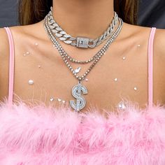 Add blingy edge to your ensembles with this necklace set boasting a bold dollar sign pendant and a chunky choker accented with sparkling cubic zirconia. Includes two cubic zirconia and silver-plated necklaces Lock curb chain necklace: 17.7" L with 2.7" extender Tennis necklace: 19.7" L with 2.7" extender Dollar sign pendant necklace: 23.6" L Pendant : 0.98" W x 1.77" L Lobster claw clasp / sliding bead closure Silver-plated copper / cubic zirconia Butterfly Choker Necklace, Butterfly Choker, Female Luxury, Chunky Choker, Curb Chain Necklace, Dollar Sign, Tennis Necklace, Silver Plated Necklace, Cuban Chain