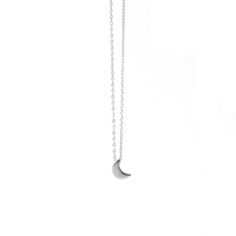 Half moon-shaped charm necklace. This delicate necklace is perfect for wearing alone or for layering with other necklaces. Everyday necklace perfect for any occasion. Details: * Crafted in Gold vermeil plated .925 sterling silver * Also available in 925 silver * Necklace measures 18inch in total. * Comes with an extension chain and can be worn at 16inch or 18inch. * Nickel free Moon charm measures: 10x6mm All jewelry comes in beautiful packaging, gift ready. Made with love Feel free to contact m Minimalist Moon Shaped Necklace As Gift, Minimalist Moon Shaped Necklace For Gift, Minimalist Moon Shape Charm Necklace With Clavicle Chain, Minimalist Moon Phase Pendant Necklace, Minimalist Crescent Necklaces For Everyday, Minimalist Half Moon Clavicle Chain Necklace, Everyday Half Moon Charm Necklace, Everyday Minimalist Crescent Necklaces, Everyday Half Moon Phase Necklace