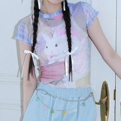 Harajuku Kawaii Aesthetic Pastel Y2K Bunny Print Mesh Tshirt Measurements S Bust: 74cm/29.1" Length: 44cm/17.3" M Bust: 78cm/30.7" Length: 45cm/17.7" L Bust: 82cm/32.2" Length: 46cm/18.1" *This product is see-through. We recommend layering another top underneath. *Standard shipping time to the US is 9-19 business days. Please consult our shipping page for shipping time estimates for other countries. *Please check the measurements/size chart very carefully when ordering from The Kawaii Factory. M Harajuku Style Multicolor Summer Tops, Summer Multicolor Harajuku Tops, Kawaii T-shirt For Summer Streetwear, Kawaii Summer T-shirt For Streetwear, Kawaii Summer Streetwear T-shirt, Multicolor Kawaii T-shirt For Spring, Harajuku Style Tops For Spring Streetwear, Fitted Harajuku Cotton Tops, Fitted Harajuku Style Summer Tops