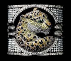 PANTHÈRE DE CARTIER HIGH JEWELRY BRACELET Platinum, cultured pearls, yellow diamonds, brown diamonds, orange diamonds, onyx, tsavorite garne... Cartier High Jewelry, Power Jewelry, Tsavorite Garnet