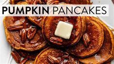 pumpkin pancakes topped with butter and pecans