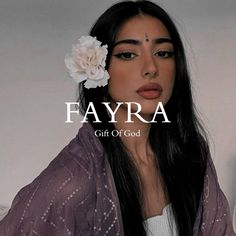 a woman with long black hair wearing a flower in her hair and the words fayrra on it