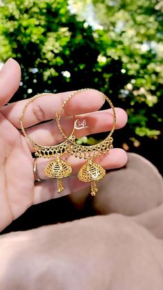 ●SAME Day Shipping if you place order between  1 am to 1 pm.  ● Ships Next working day from New York city with USPS standard 3-5 working day delivery service.  ● Everyday Wear Convince Earrings for Gold Lovers. ● Handmade and Finished Simple Lightweight Hoop Drop Earrings. 18k Dubai Gold plated Dangling One Bell Hoops  These Bell Beaded Flower Umbrella Jhumka Earrings a best and cute gift for Teen girls. Also Simple Gift for anyone or Special Gift for Her. Handmade Hoop Earrings are so pretty.  Quality Granted . Comes with Jewelry box. Ready to Gift. Premium Quality  Look like real Dubai gold jewelry.  Very lightweight jumka Earrings. Check our other Little Hoops Earrings *  https://www.etsy.com/listing/1375981318/22k-real-dubai-gold-finish-hoop-bali * https://www.etsy.com/listing/13964540 Festive Adjustable Earrings For Gifts, Festive Gift Earrings, Metal Jhumkas Drop Earrings For Gifts, Adjustable Festive Earrings For Celebration, Adjustable Gold Festive Earrings, Gift Chandbalis For Pierced Ears, Festive Beaded Drop Earrings, Round Hoop Earrings For Festivals, Hoop Jewelry With Latkans For Gift