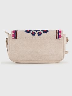 YASMINE SLING BAG – BEIGEHandcrafted Embroidered Sling Bag from India - Stylish and Artfully Designed.Elevate your style with Beige Base Sling Bag featuring intricate Blue Wool Embroidery. This Boho Chic Crossbody Bag combines practicality with a unique Artisan Design. Stand out elegantly with this Floral Embroidered Handbag, perfect for any adventure.- Material: Cotton Canvas (Embroidered)- Dimensions: (H) 6.5“x (W) 10“x (D) 2“- Bag Height including Handle = 29“- Handle Drop = 22.5" (Adjustable Multicolor Embroidered Shoulder Bag With Adjustable Strap, Traditional Beige Satchel Shoulder Bag, Embroidered Beige Shoulder Bag For Travel, Travel Embroidered Beige Shoulder Bag, Daily Use Multicolor Embroidered Shoulder Bag With Adjustable Strap, Multicolor Embroidered Crossbody Shoulder Bag With Adjustable Strap, Traditional Beige Shoulder Bag, Beige Floral Embroidered Shoulder Bag As Gift, Beige Floral Embroidery Shoulder Bag Gift