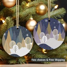 two christmas ornament hanging from a tree with snow and trees in the background