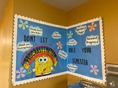 a bulletin board with spongebob sayings and pictures on the wall in a child's room