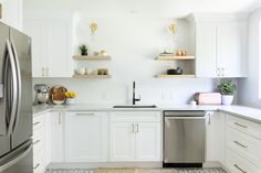 the kitchen is clean and ready for us to use it's stainless steel appliances