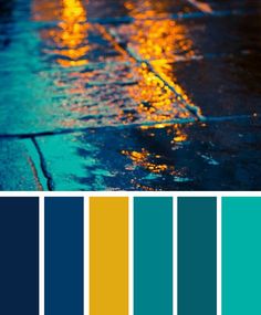 the color scheme is blue, yellow and green with an umbrella in the rain at night