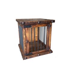 an old wooden cage with metal bars on the top and bottom, is shown against a white background